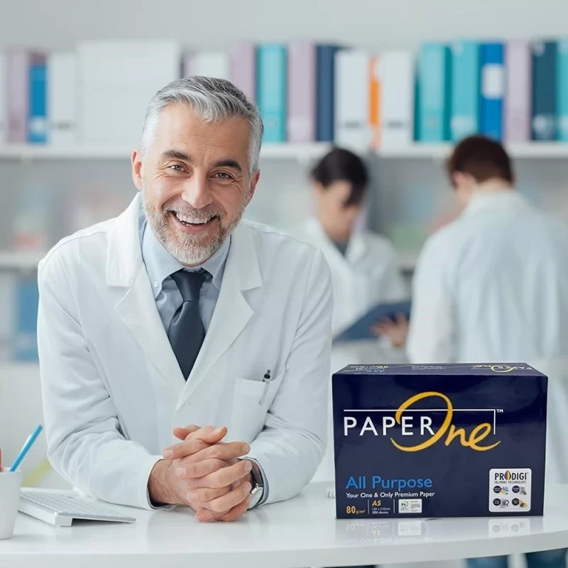 Risme di carta A5 80gr PaperOne ad alto grado di bianco e certificazione ISO 9706 per archiviazione.